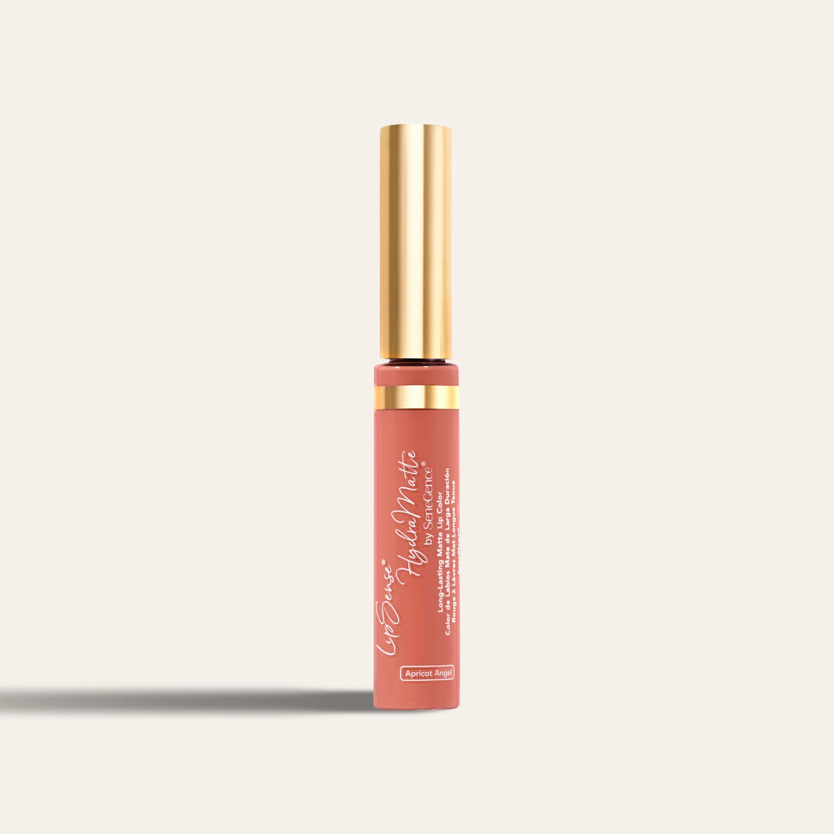 LipSense® Cream by SeneGence: a coral tube in Apricot Angel with a gold cap.