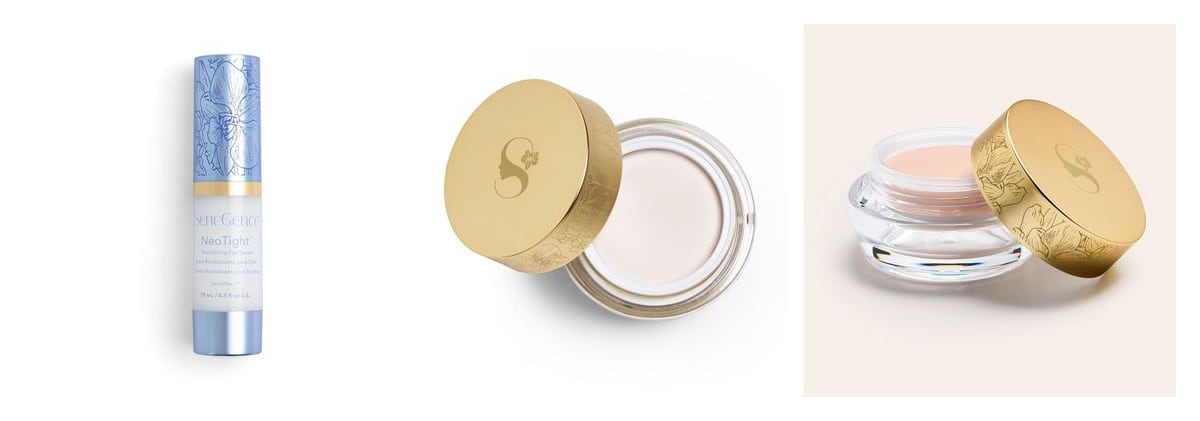 Three SeneGence eye products side by side: NeoTight Eye Serum in a slim orchid-printed blue bottle, an open jar of EyeCrème, and an open jar of peach EyeLuminator Under Eye Brightening Cream.