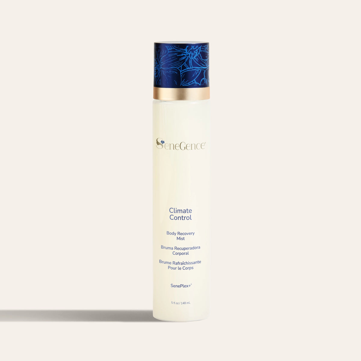 Climate Control Body Recovery Mist by SeneGence: a cream bottle with a dark blue orchid-decorated cap.