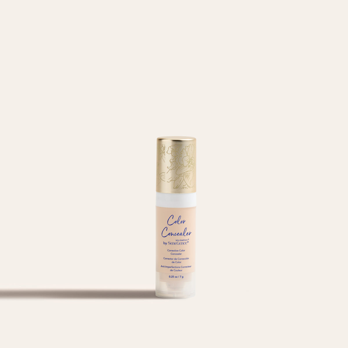 Corrective Color Concealer by SeneGence: a small pale-beige concealer bottle with a white collar and a gold orchid-engraved cap.