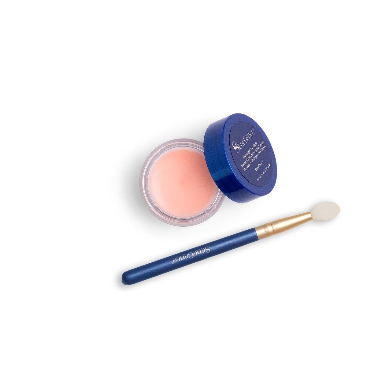 Overnight Lip Mask with Applicator by SeneGence: an open pink lip-mask pot with a blue lid beside a blue-and-gold applicator.