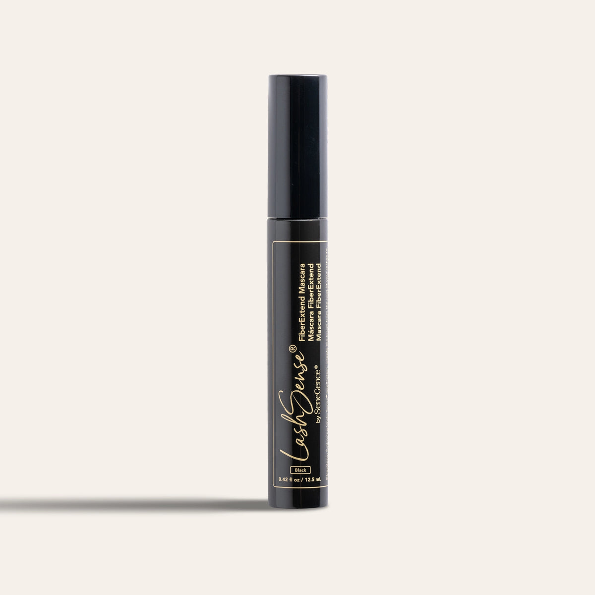 LashSense FiberExtend Mascara by SeneGence: A glossy black mascara tube with a black cap and gold lettering framed by a thin gold outline.