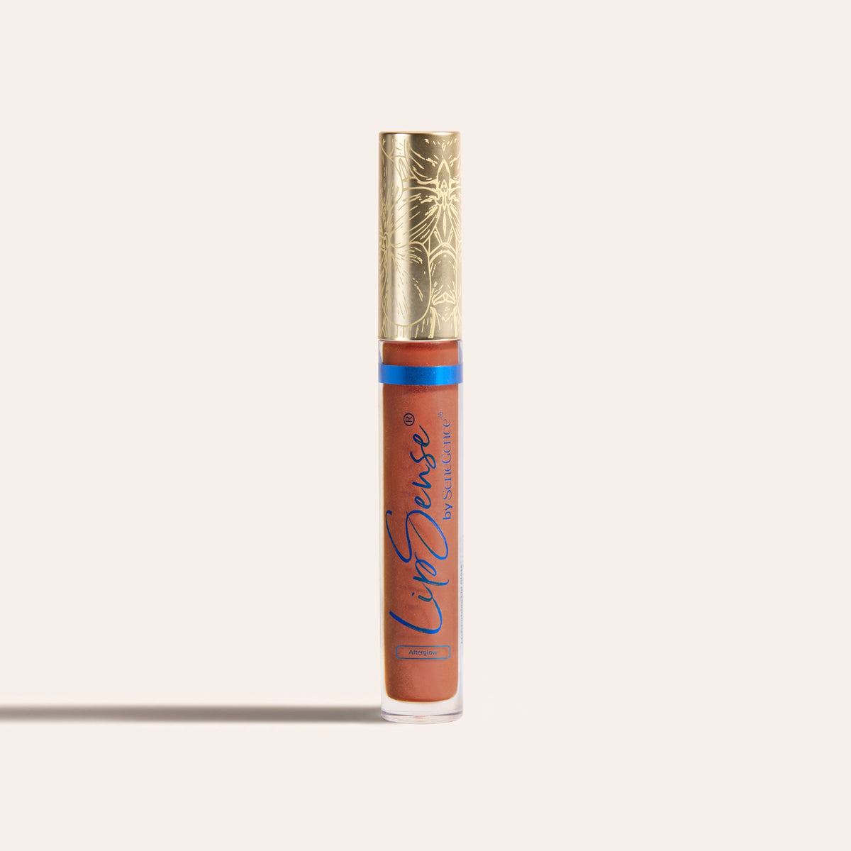 LipSense® Moisturizing Gloss by SeneGence: A clear tube of warm-toned gloss with a gold cap.