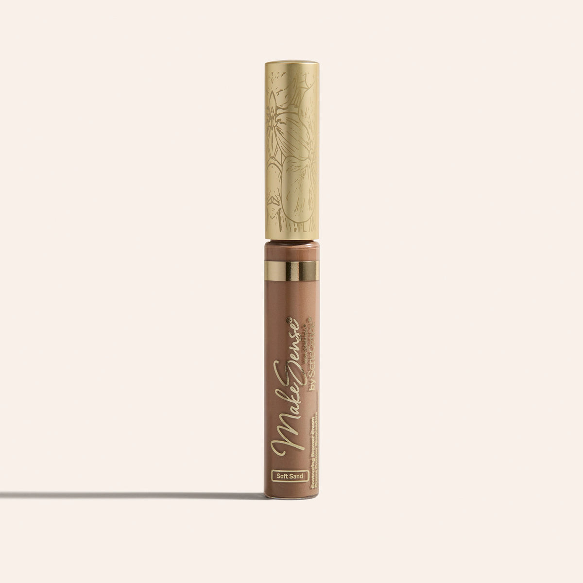 MakeSense Contouring Bronzer Cream by SeneGence: A brown bronzer tube with a gold cap.