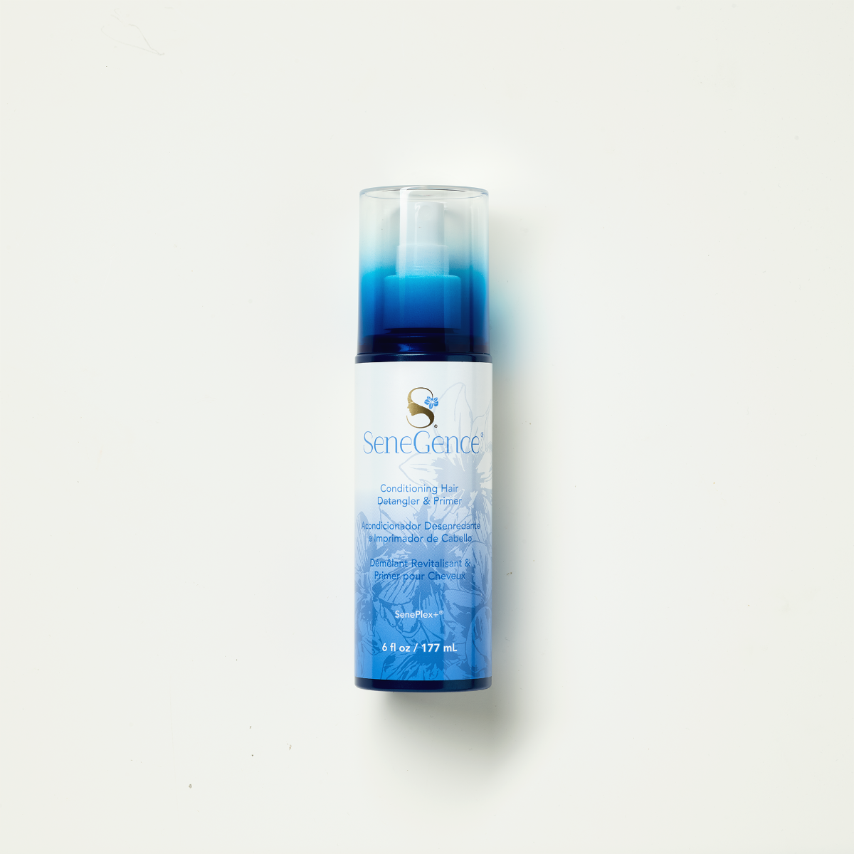 SeneGence Conditioning Hair Detangler and Primer by SeneGence: A blue-and-white hair-care spray bottle with a clear cap.