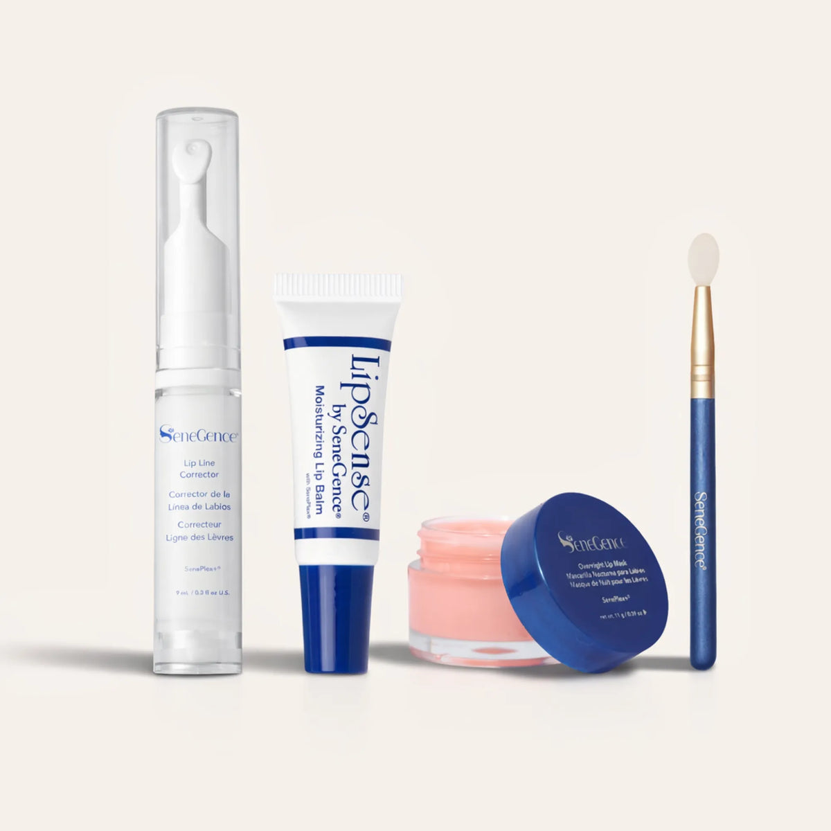 The Ultimate Lip Care Collection by SeneGence: A lip-care pump bottle, balm tube, pink mask pot and applicator.